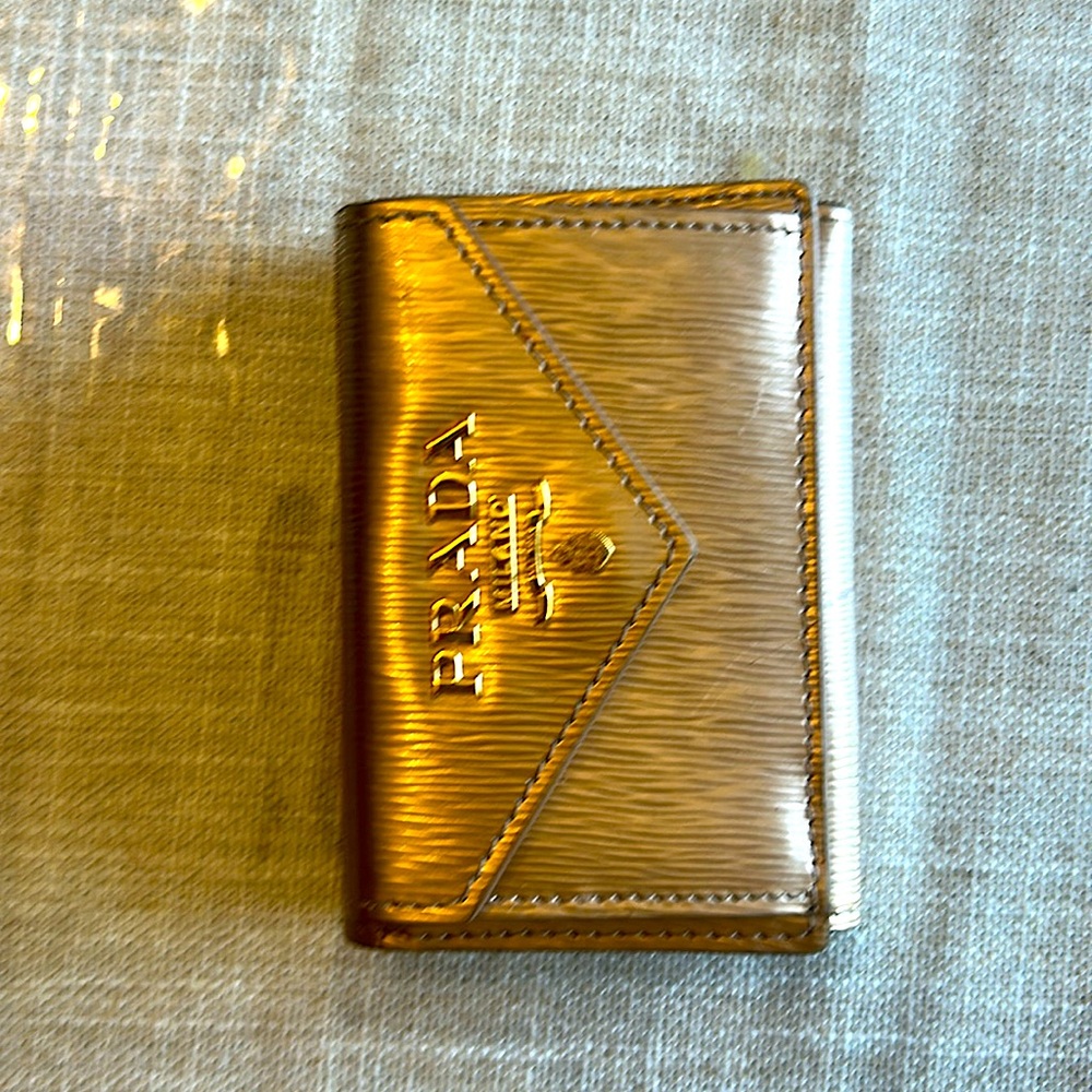 Prada Tri-fold Wallet in metallic gold leather